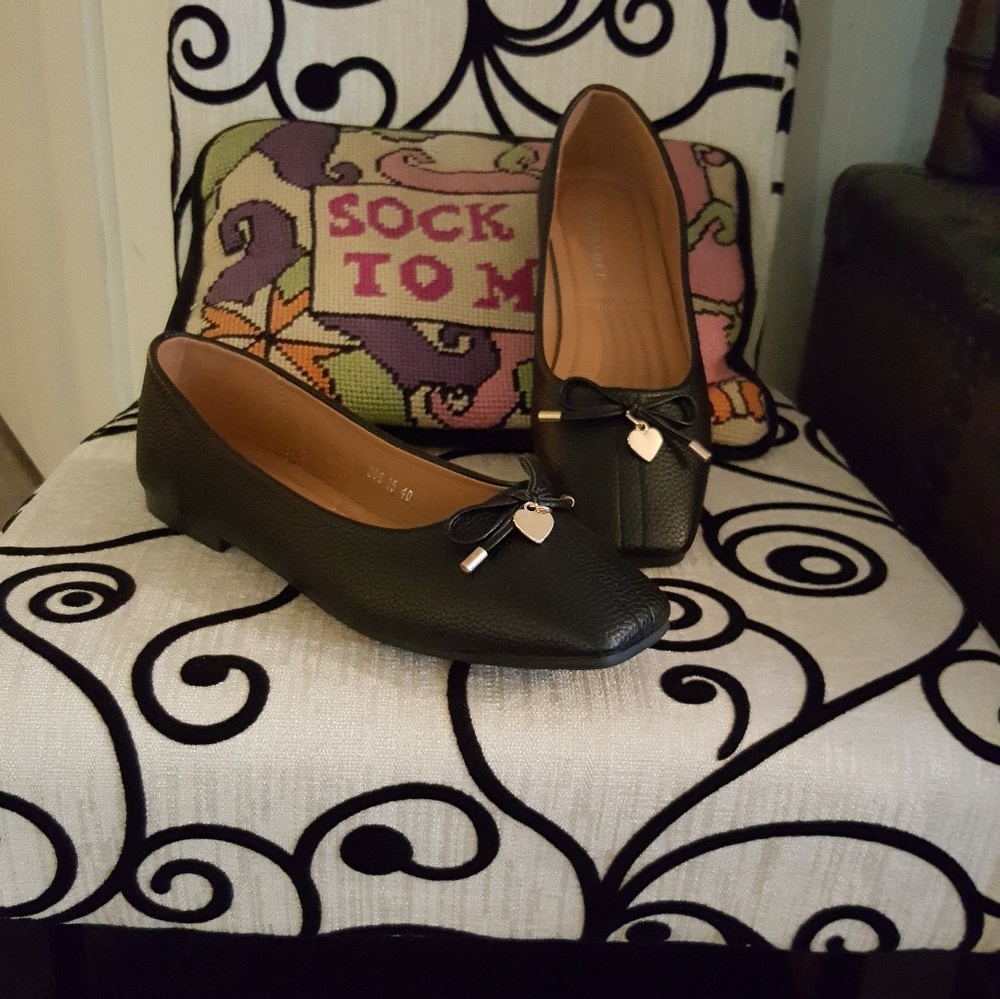 Black flats with bow,and heart charm
